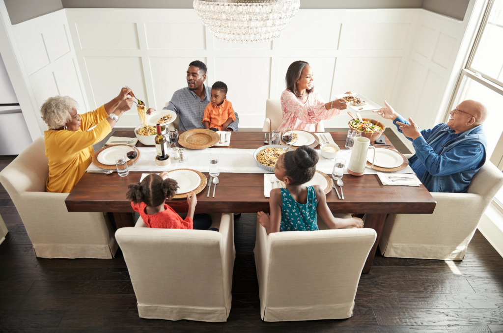 Family enjoying meal | Bell County Flooring