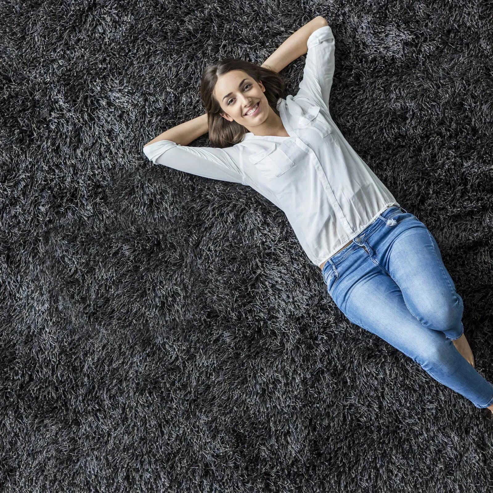 Girl chilling on carpet | Bell County Flooring